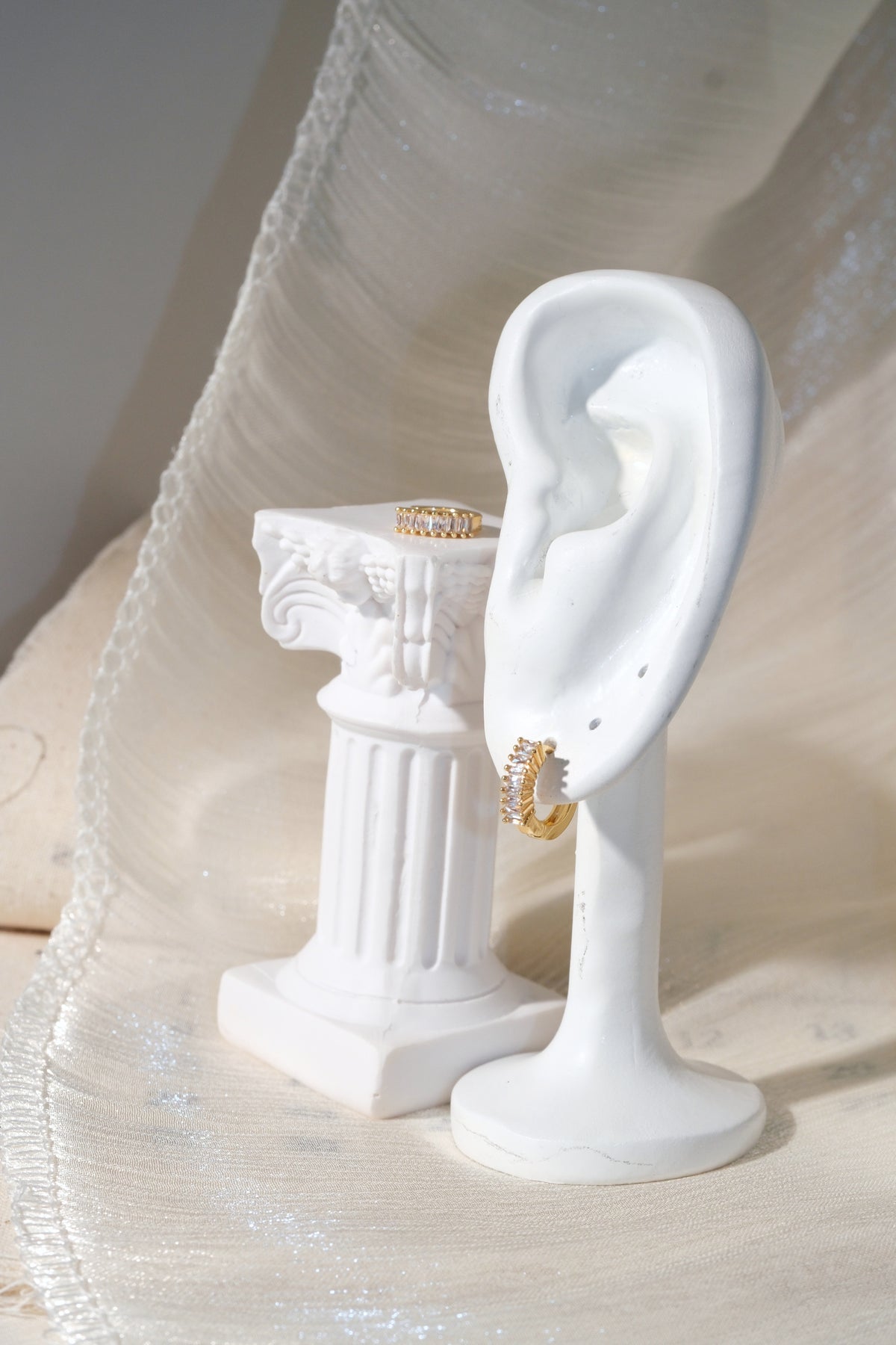 Baguette CZ Huggies — Gold — edited real product photo