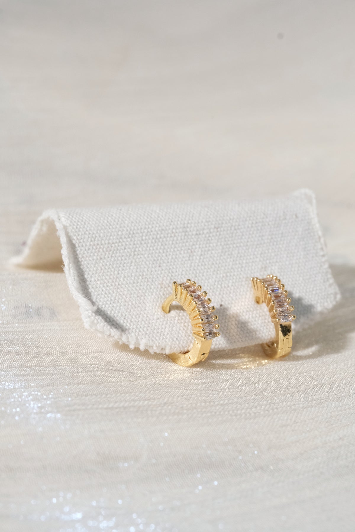 Baguette CZ Huggies — Gold — edited real product photo