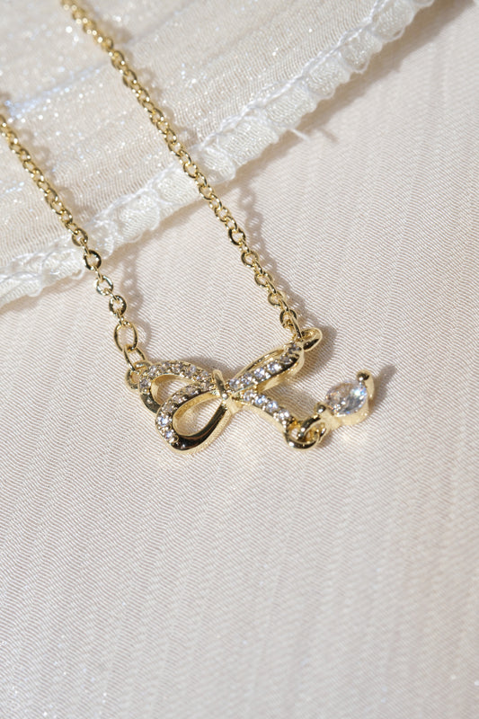 CZ Bow Drop Necklace — Gold — edited real product photo