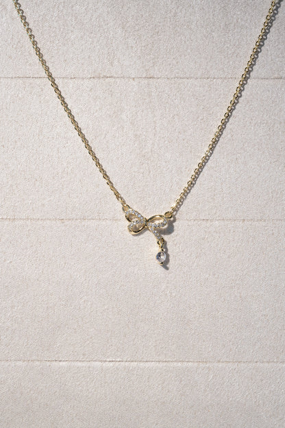 CZ Bow Drop Necklace — Gold — edited real product photo