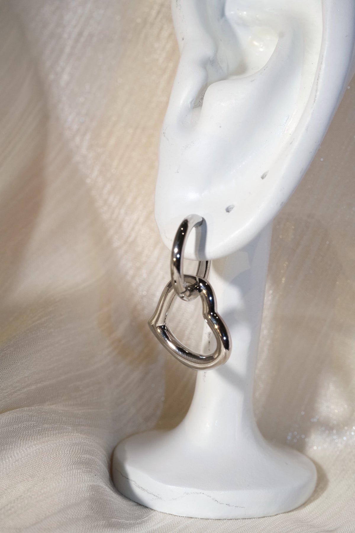 Open Heart Drop Earrings — Silver — edited real product photo