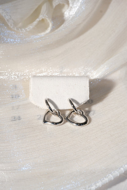 Open Heart Drop Earrings — Silver — edited real product photo