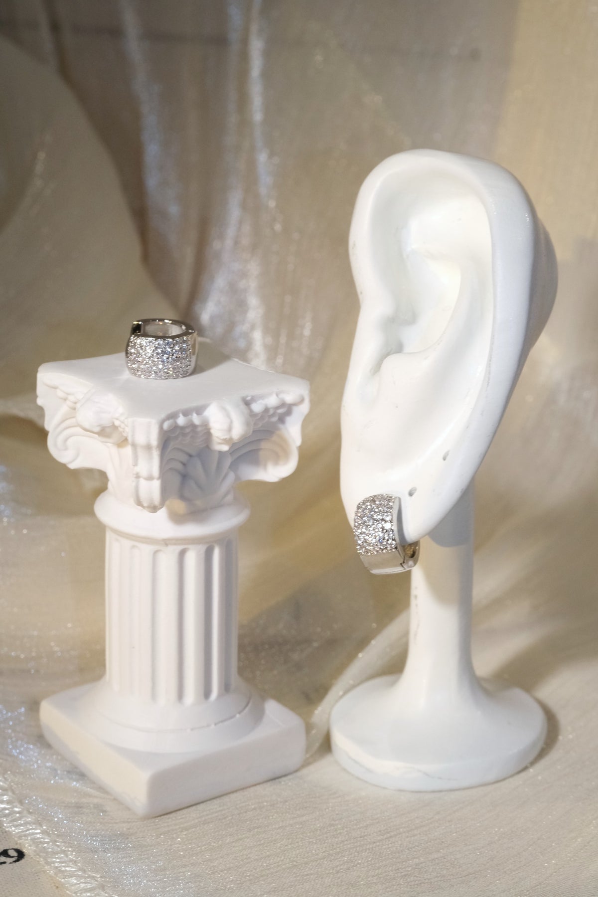 Wide Pavé Huggie Earrings — Silver — edited real product photo
