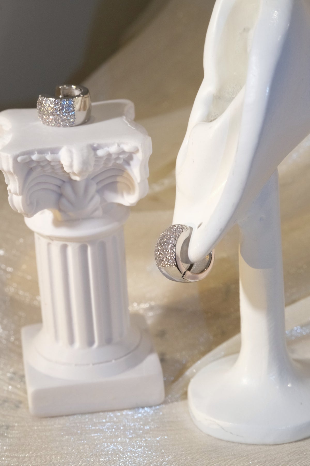 Wide Pavé Huggie Earrings — Silver — edited real product photo