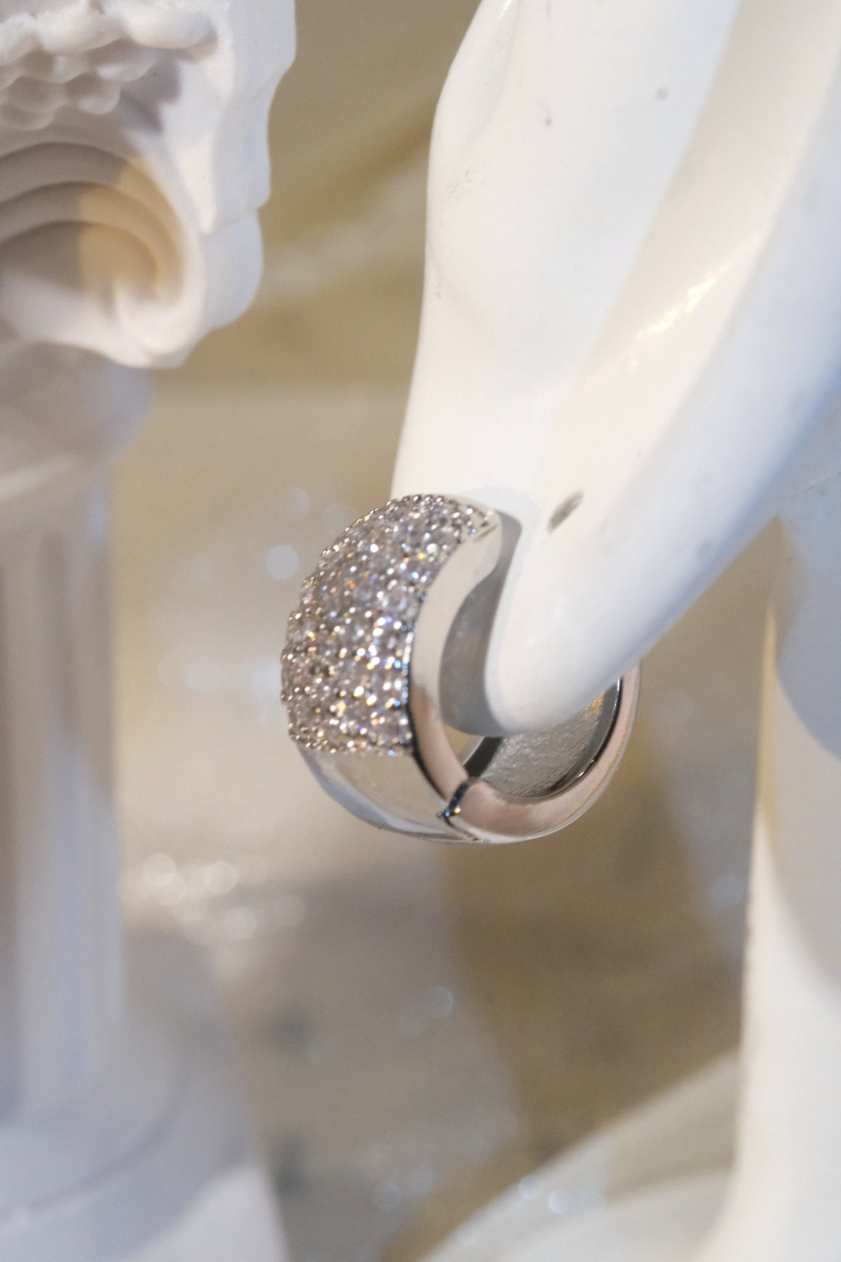Wide Pavé Huggie Earrings — Silver — edited real product photo