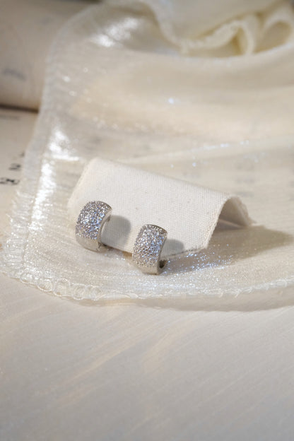 Wide Pavé Huggie Earrings — Silver — edited real product photo