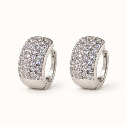 Wide Pavé Huggie Earrings — Silver — white background