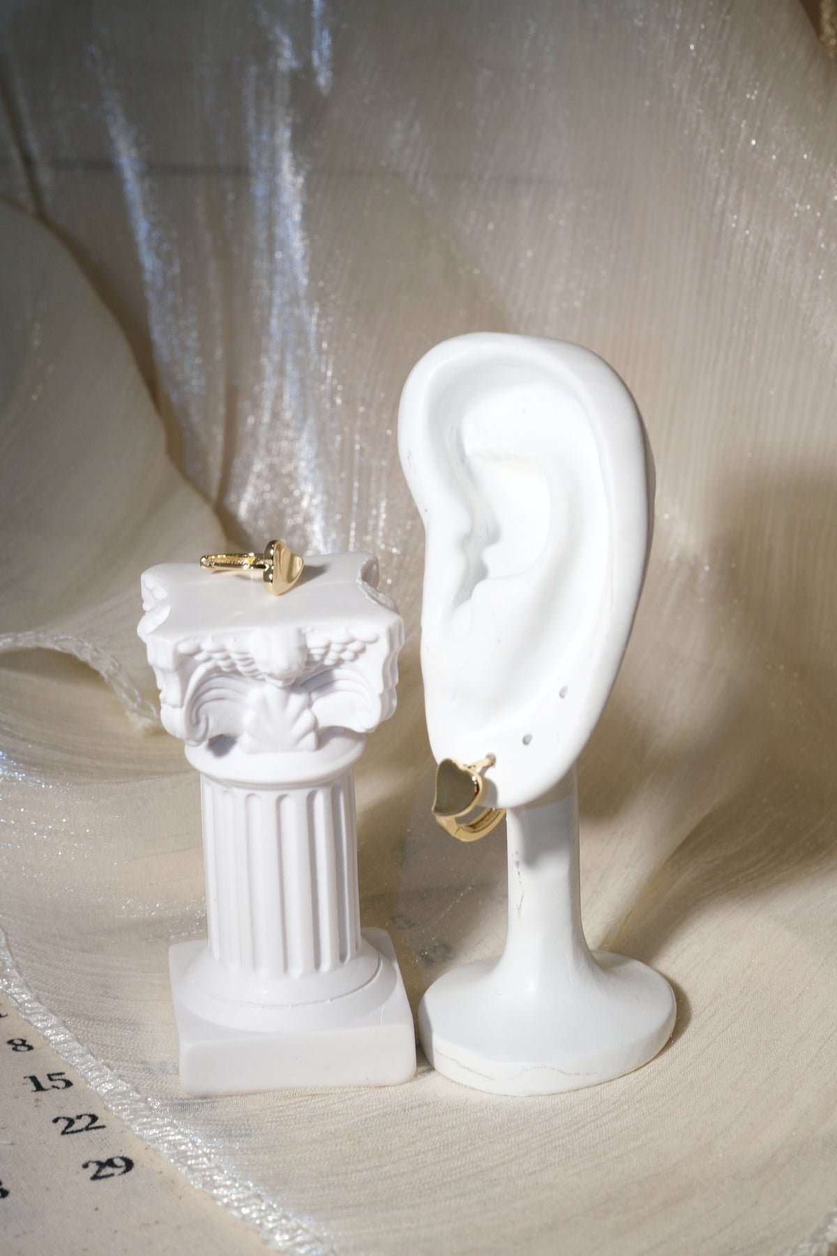 Heart Front Huggie Earrings — Gold — edited real product photo