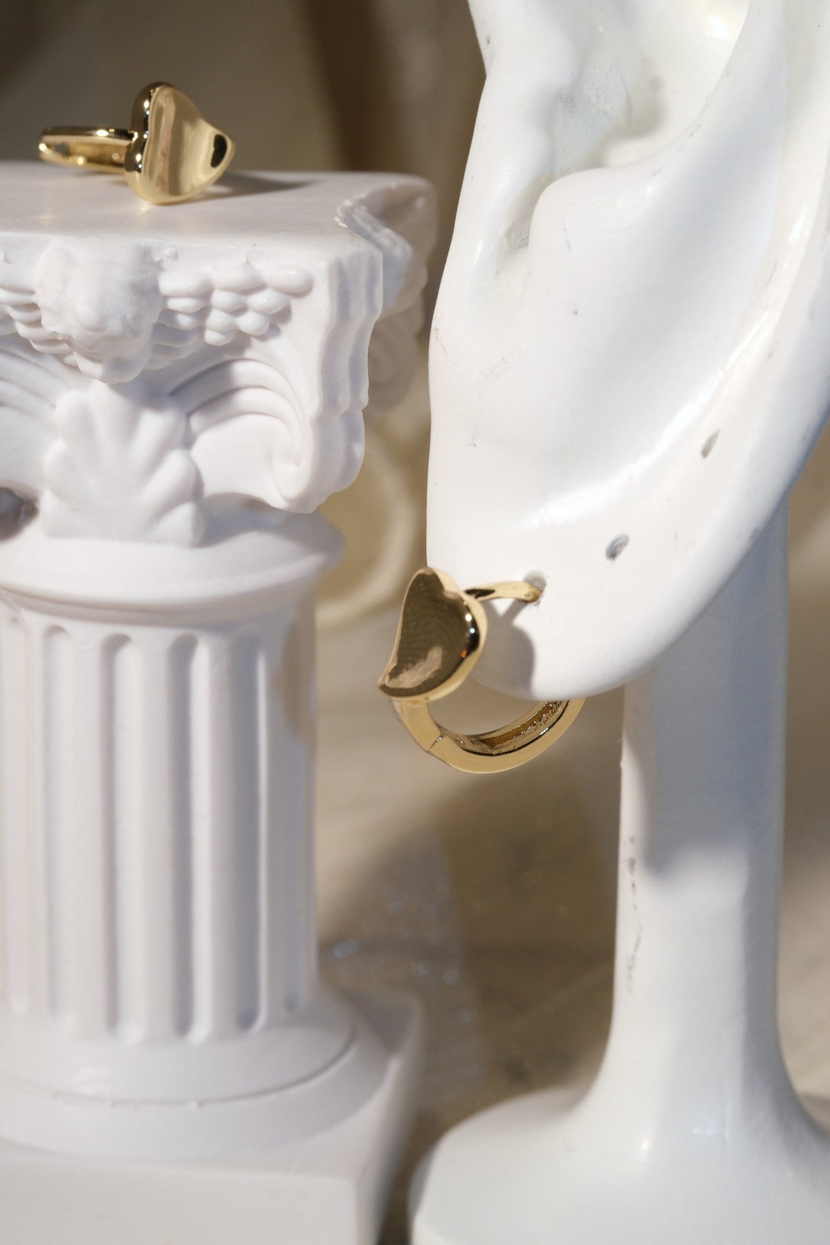 Heart Front Huggie Earrings — Gold — edited real product photo