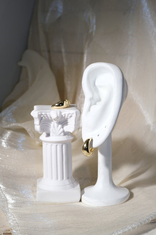 Rounded Huggie Earrings — Gold — edited real product photo