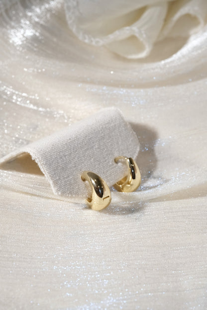 Rounded Huggie Earrings — Gold — edited real product photo