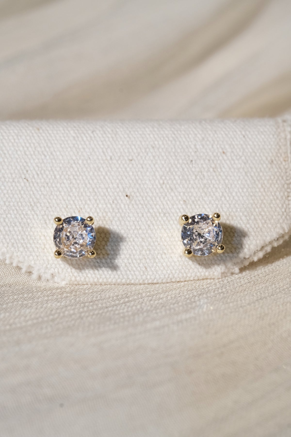 Solitaire CZ Stud Earrings — Gold — edited real product photo