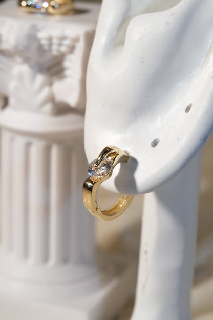 Solitaire CZ Huggie Earrings — Gold — edited real product photo