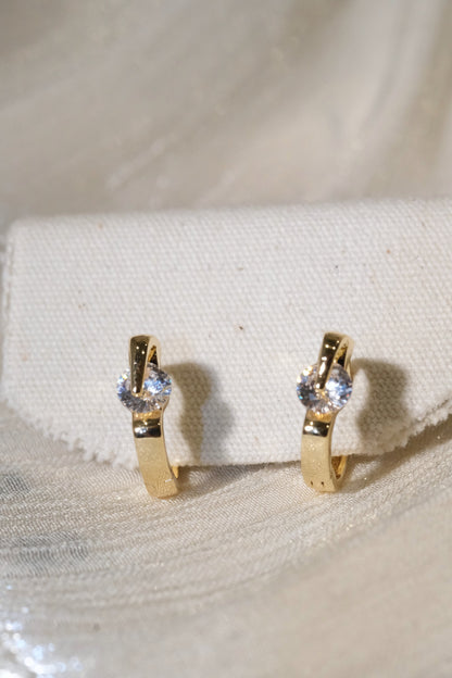 Solitaire CZ Huggie Earrings — Gold — edited real product photo