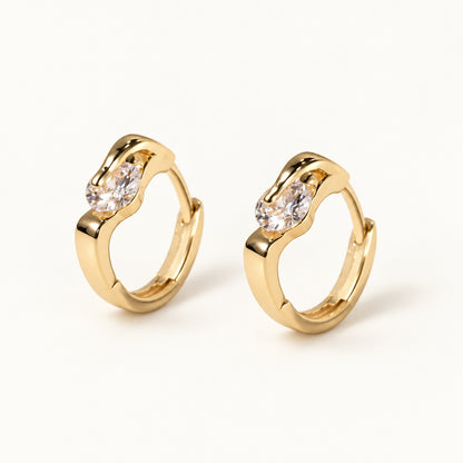 Solitaire CZ Huggie Earrings — Gold — white background