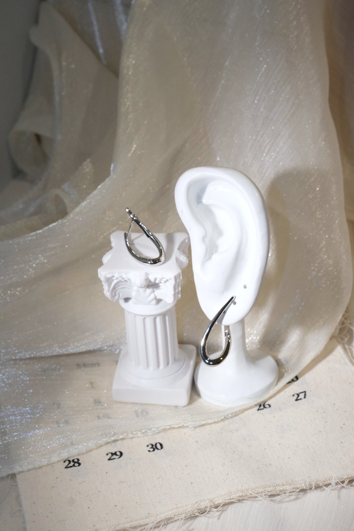 Teardrop Hoop Earrings — Silver — edited real product photo