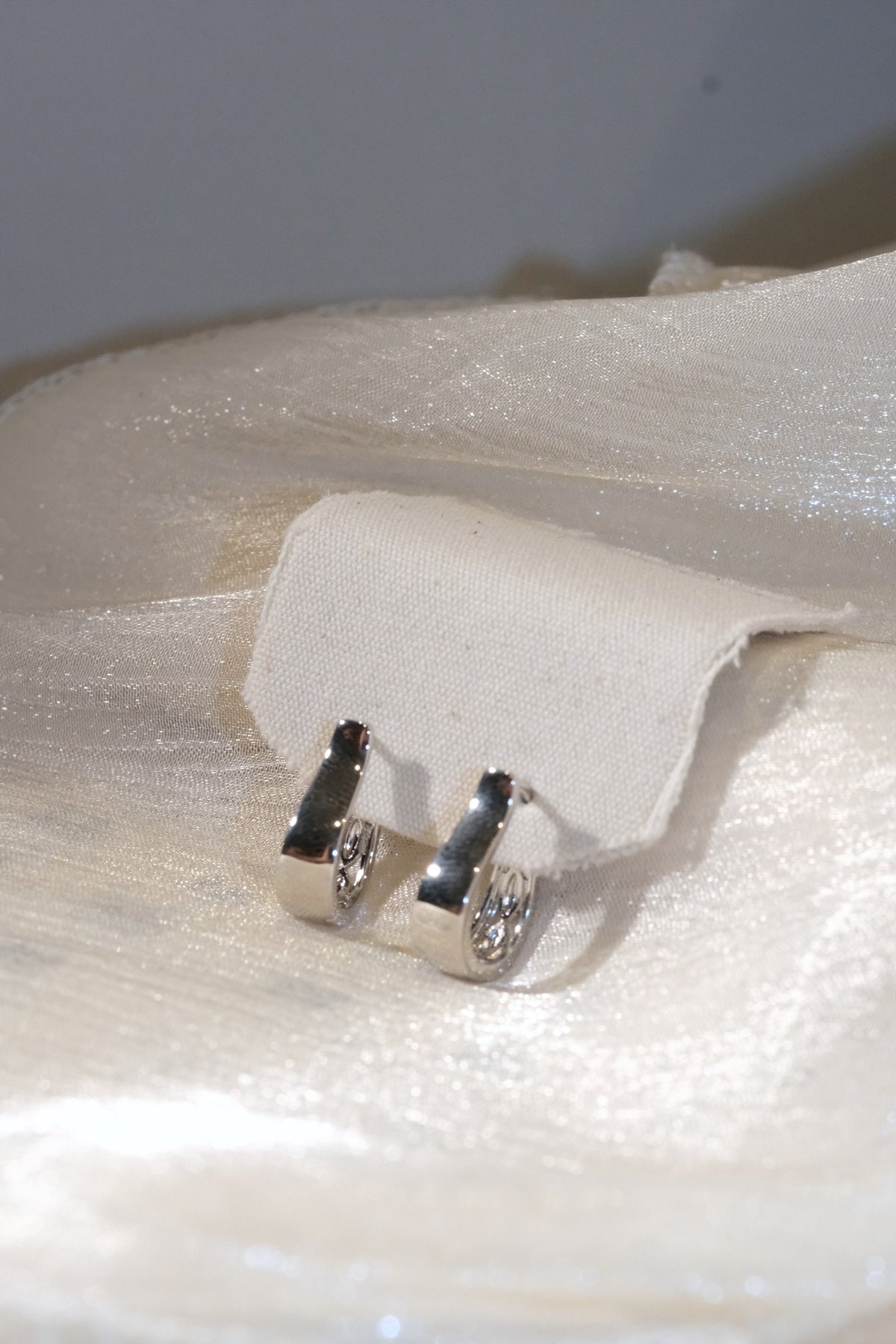Slim Polished Hoop Earrings — Silver — edited real product photo