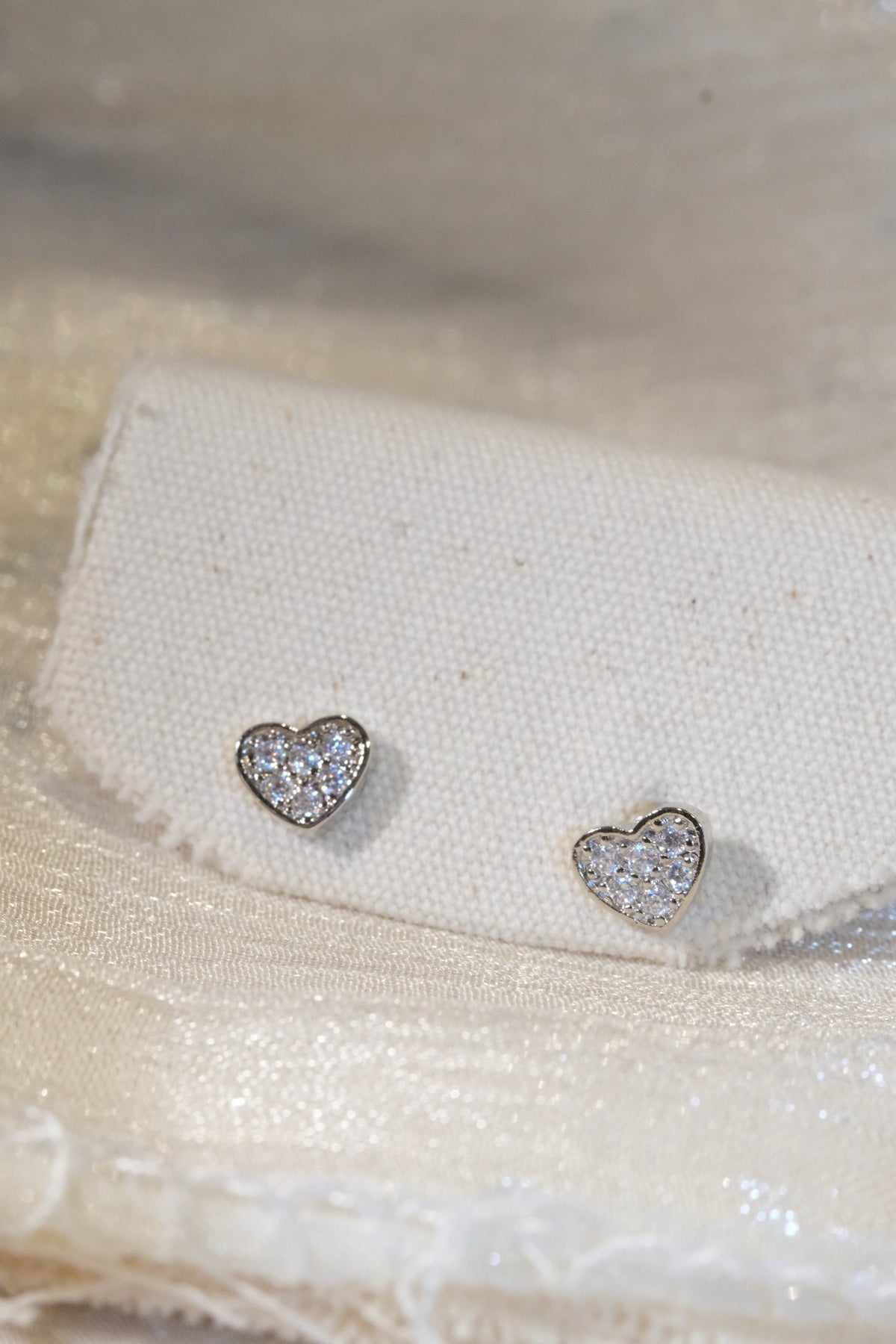 Pavé Heart Stud Earrings — Silver — edited real product photo