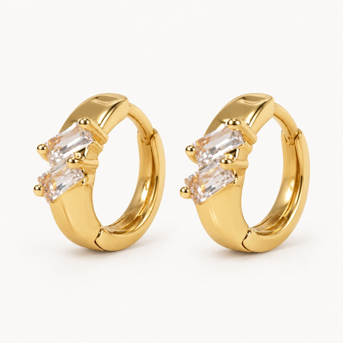 Offset Baguette CZ Huggie Earrings — Gold