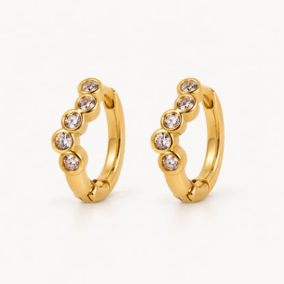 Five-Stone Bezel CZ Huggie Earrings — Gold — white background