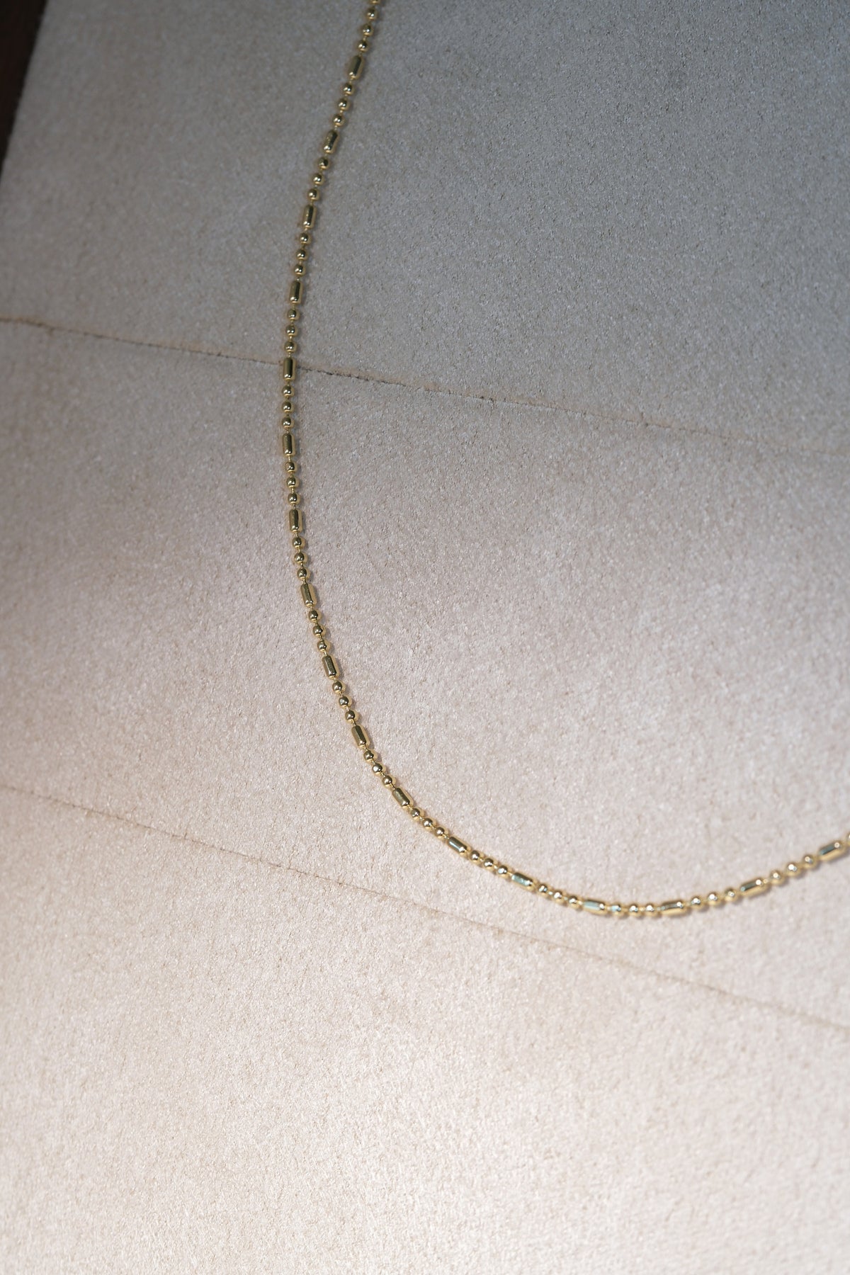 Ball and Bar Chain — Gold — edited real-life photo