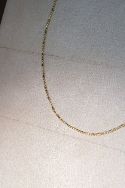 Ball and Bar Chain — Gold — edited real-life photo