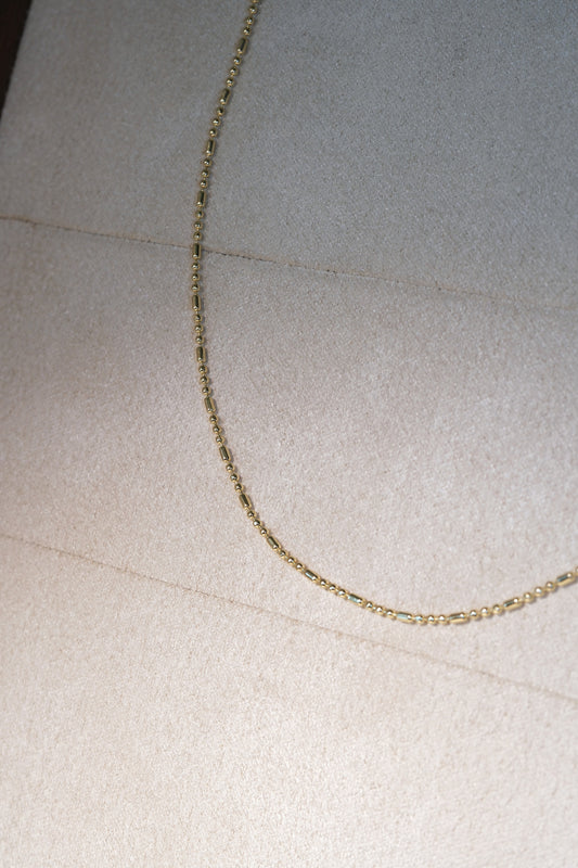 Ball and Bar Chain — Gold — edited real-life photo