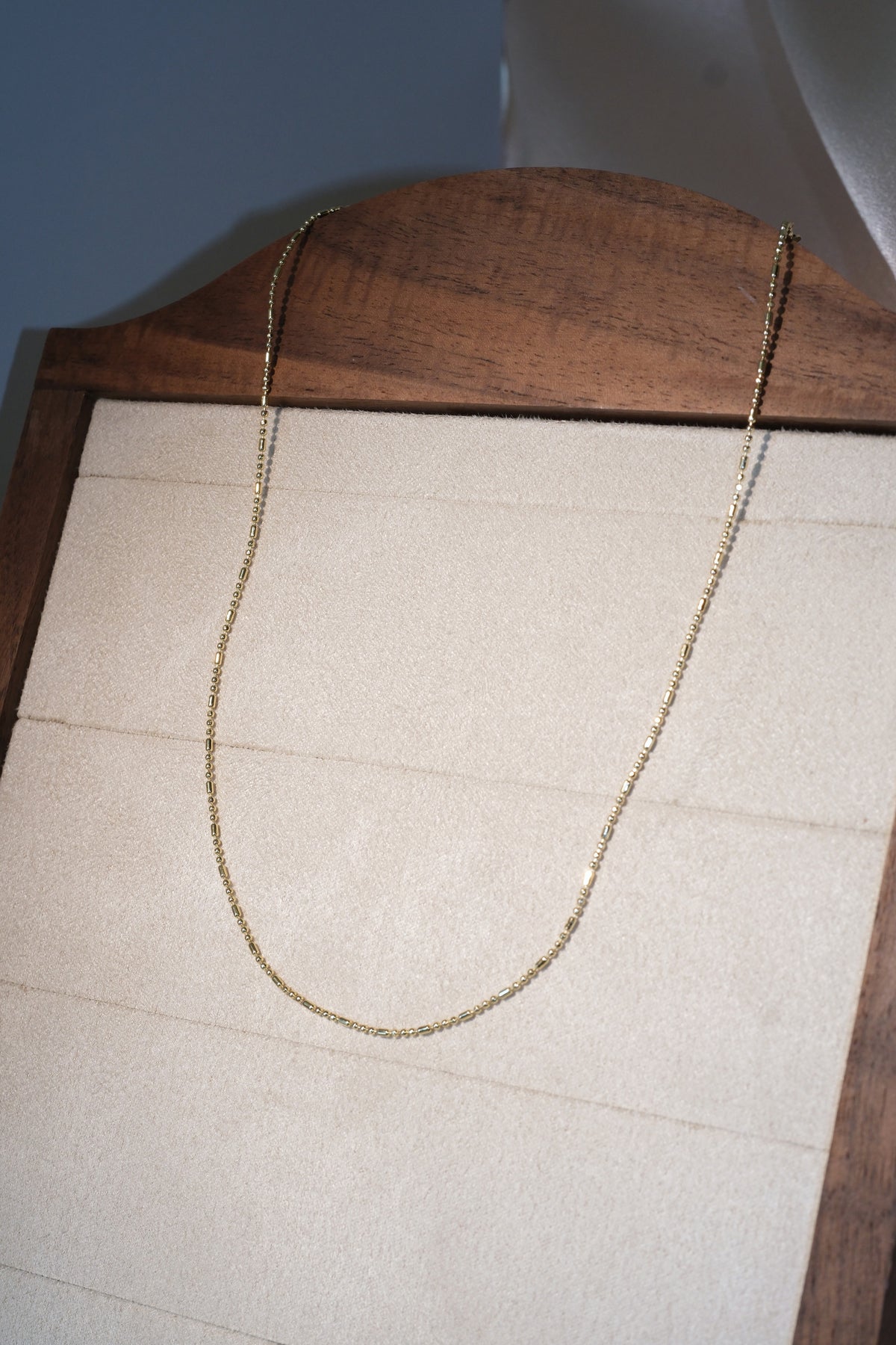 Ball and Bar Chain — Gold — edited real-life photo