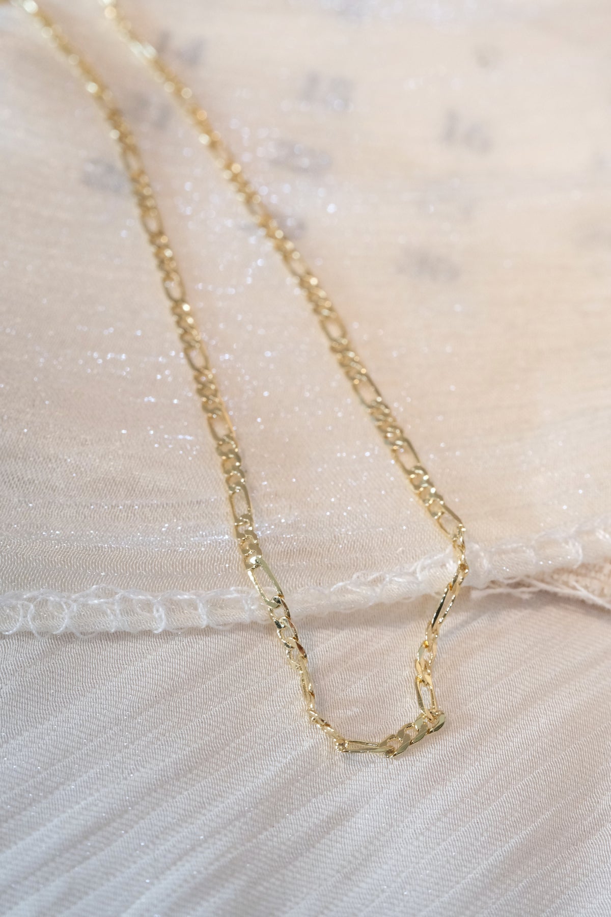 Figaro Chain — Gold — edited real-life photo