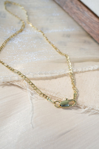 Figaro Chain — Gold — edited real-life photo