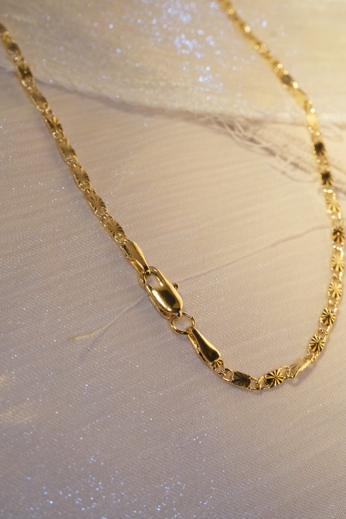 Engraved Flat Link Chain — Gold — edited real-life photo
