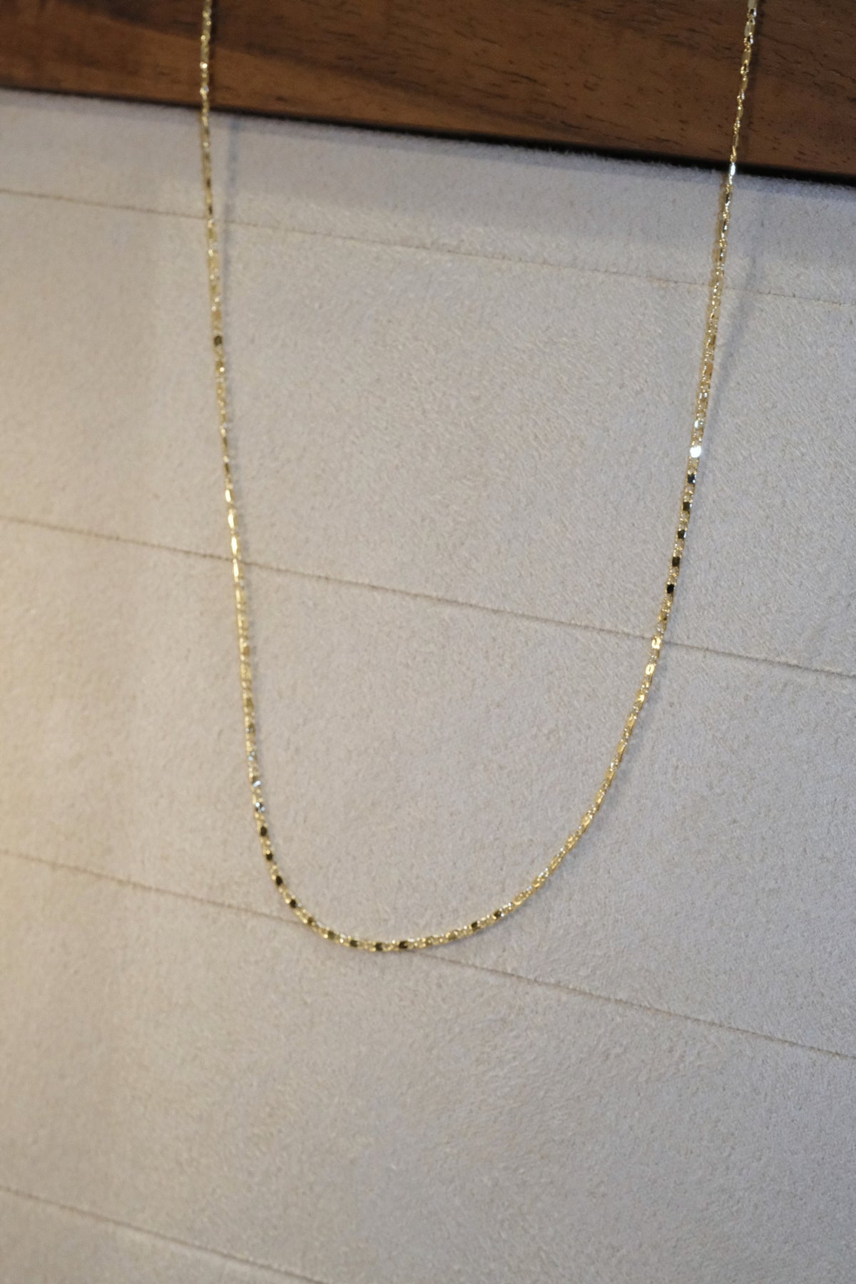 Fine Oval Station Chain — Gold — edited real-life photo