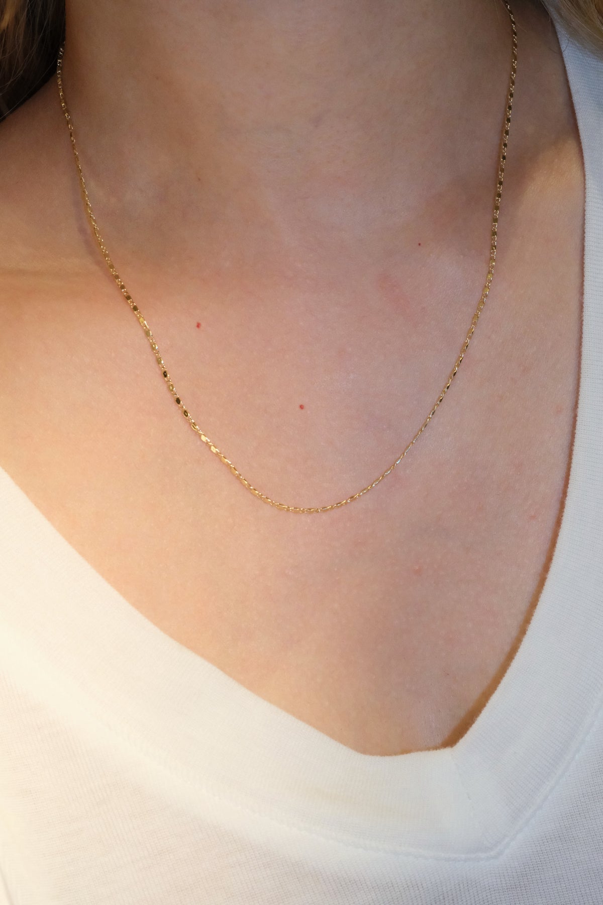 Fine Oval Station Chain — Gold — edited real-life photo