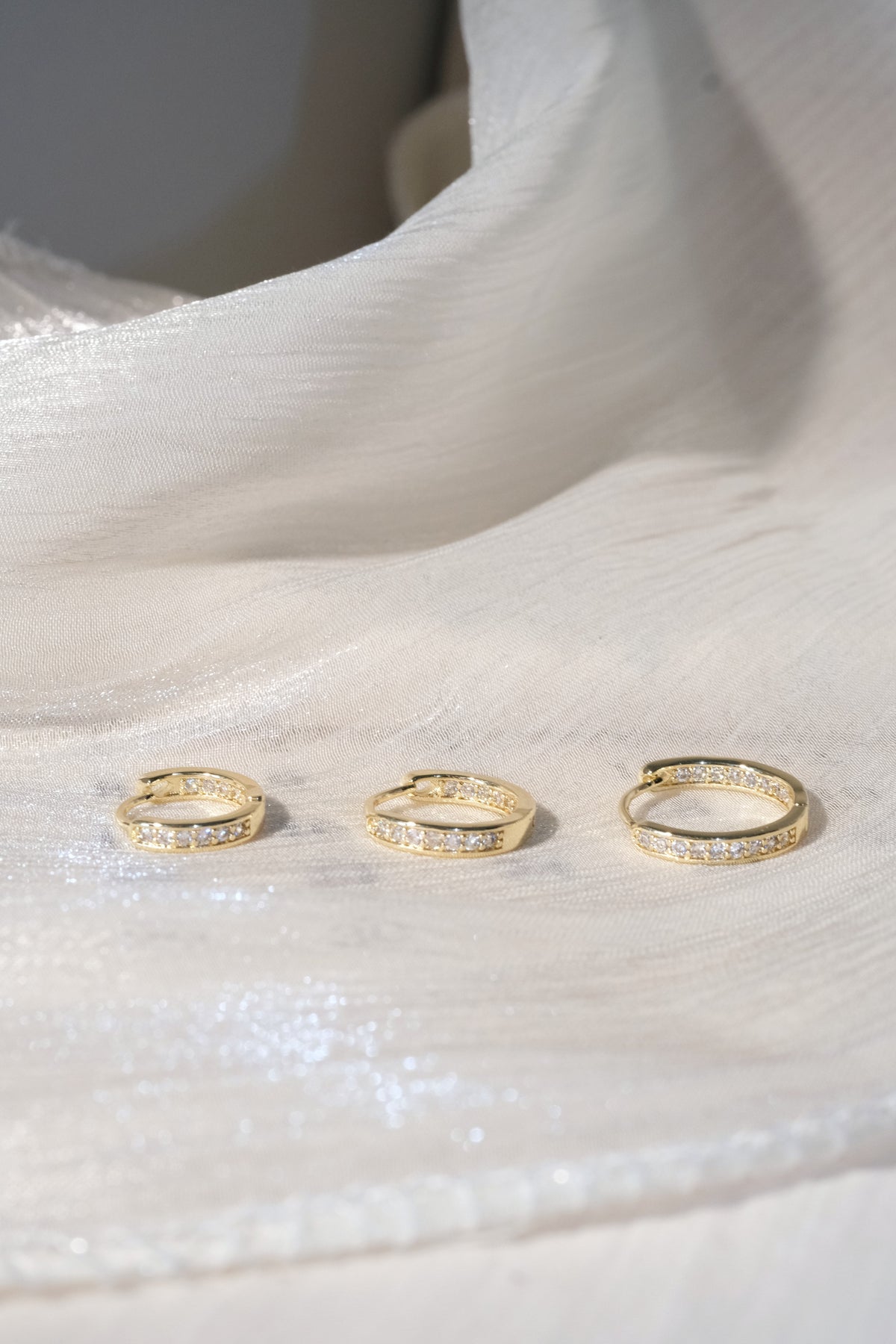 Slim Pave Hoop Earrings — Gold — edited real-life photo
