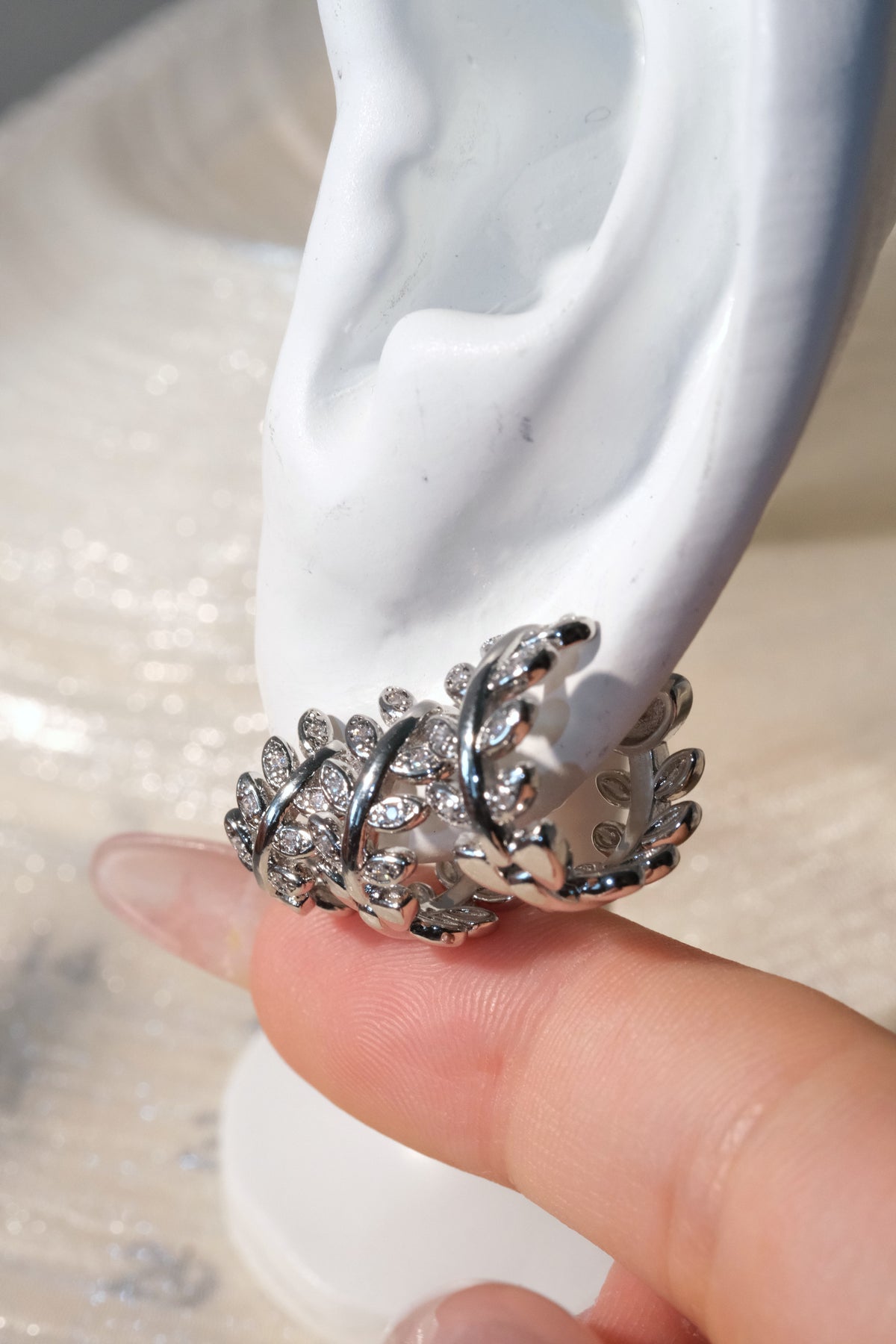 Leaf CZ Hoop Earrings — Silver — edited real-life photo