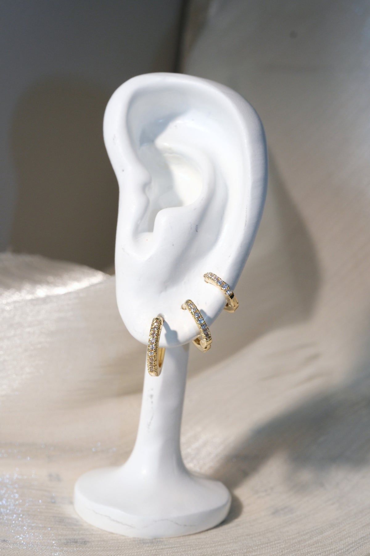 Prong Set CZ Hoop Earrings — Gold — edited real-life photo
