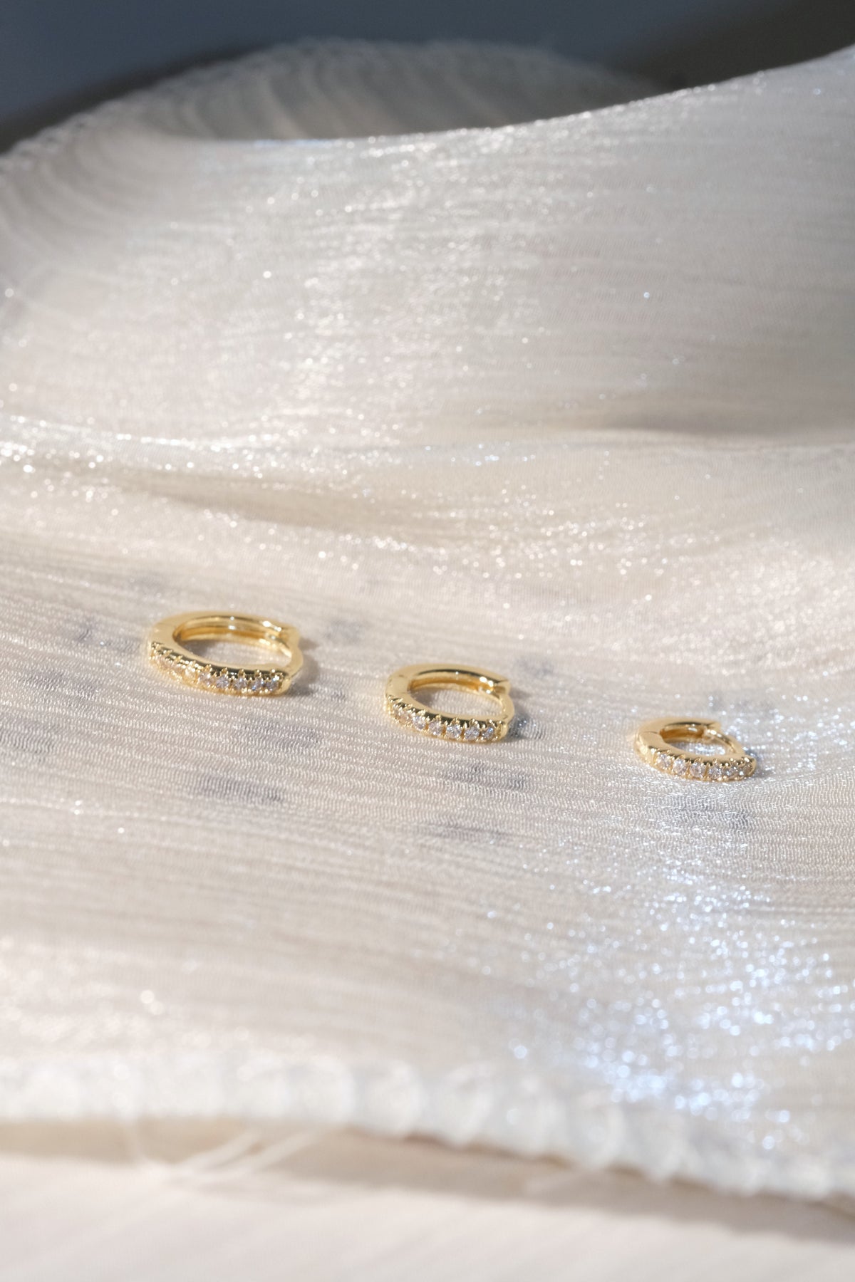 Prong Set CZ Hoop Earrings — Gold — edited real-life photo
