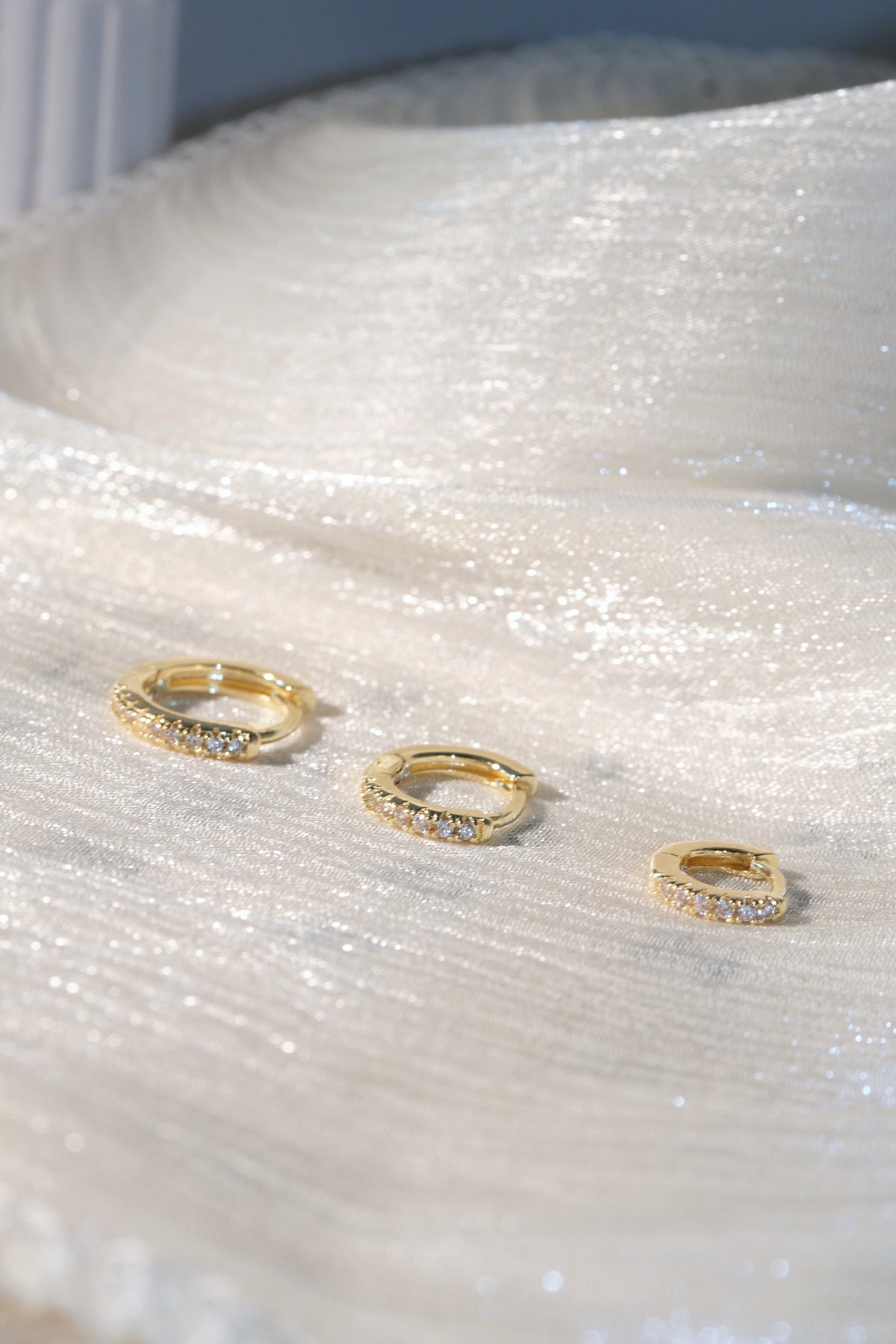 Prong Set CZ Hoop Earrings — Gold — edited real-life photo