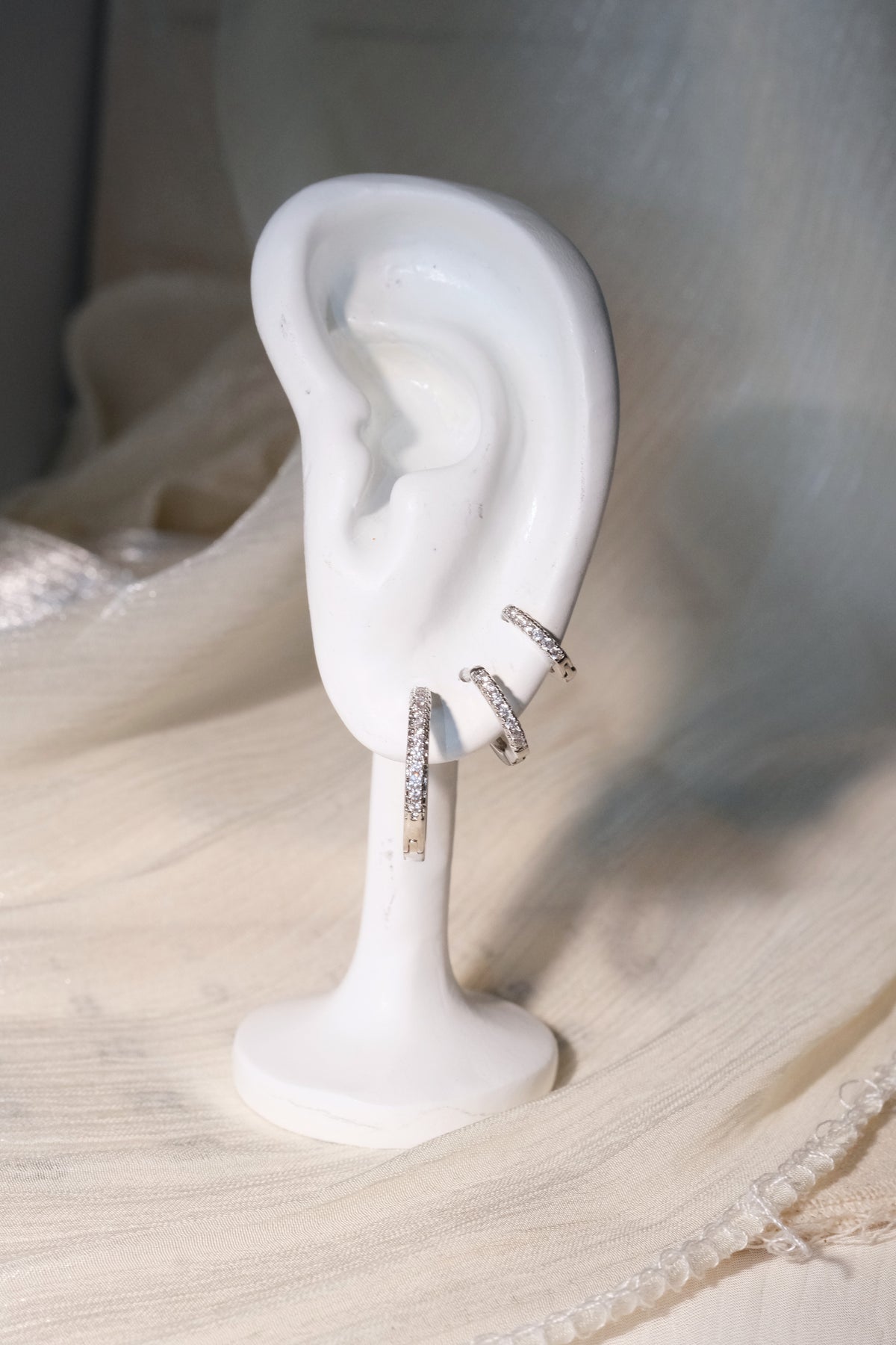 Prong Set CZ Hoop Earrings — Silver — edited real-life photo