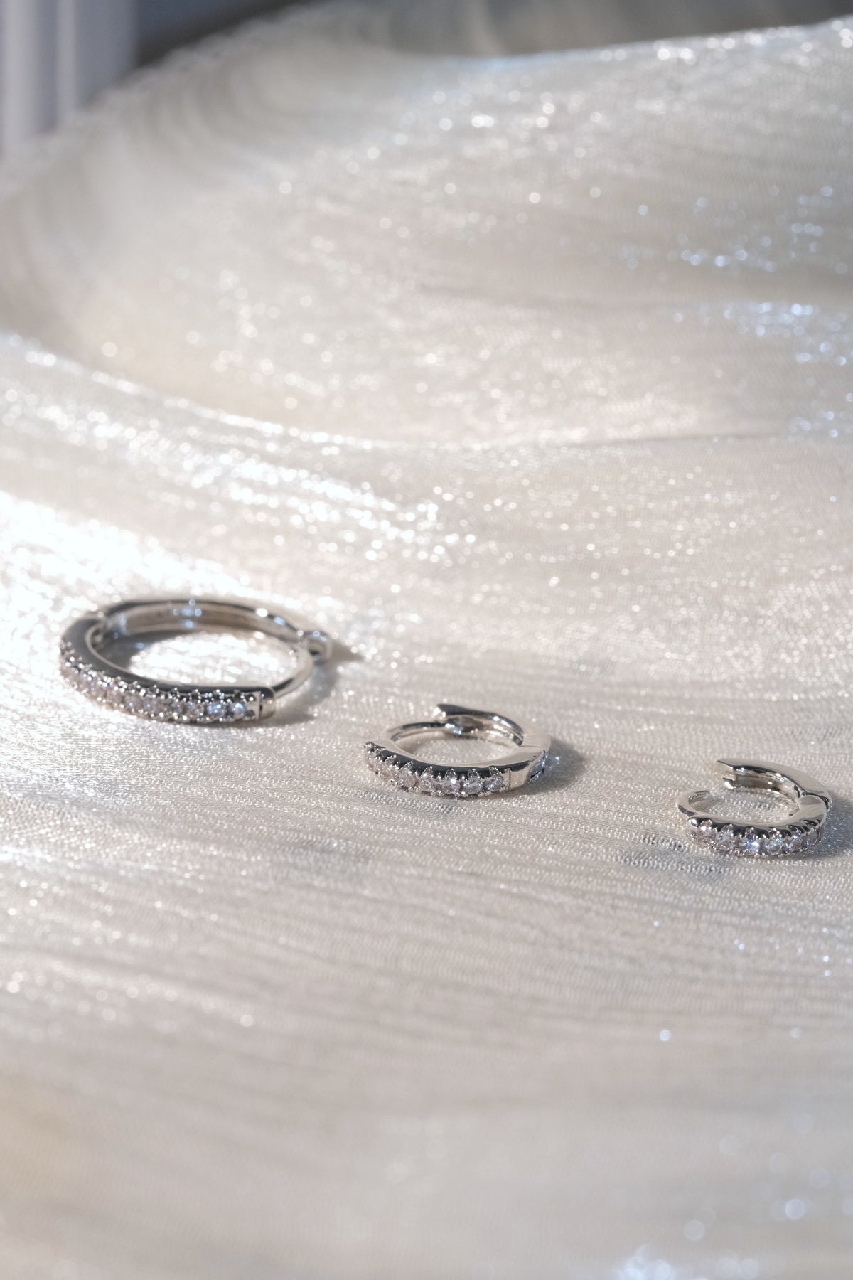 Prong Set CZ Hoop Earrings — Silver — edited real-life photo