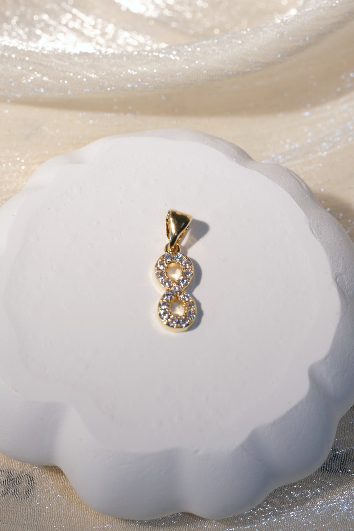 Infinity CZ Pendant — Gold — edited real-life photo