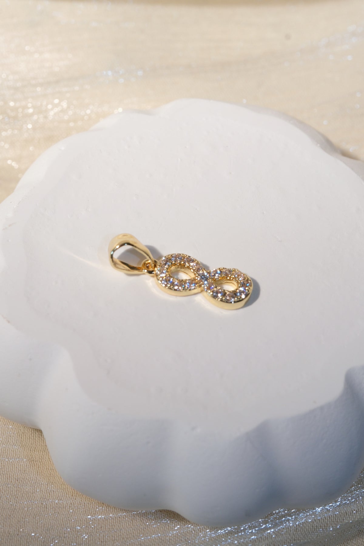 Infinity CZ Pendant — Gold — edited real-life photo