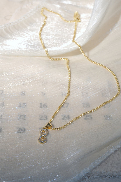 Infinity CZ Pendant — Gold — edited real-life photo