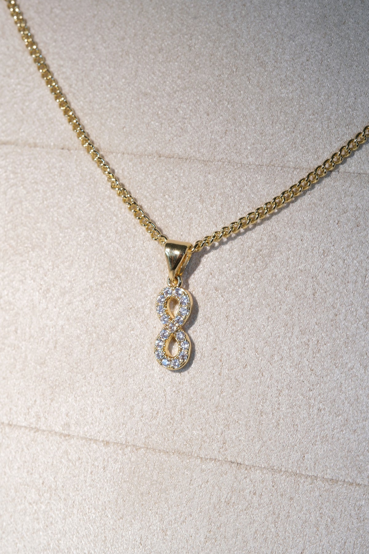 Infinity CZ Pendant — Gold — edited real-life photo