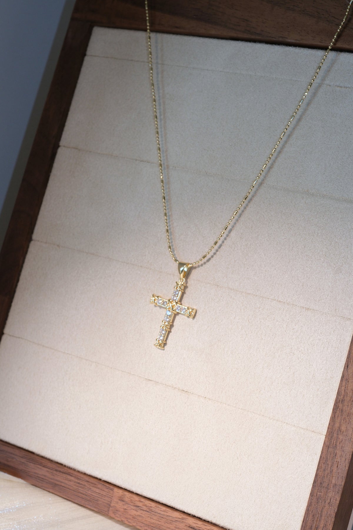 Beaded Cross Pendant — Gold — edited real-life photo