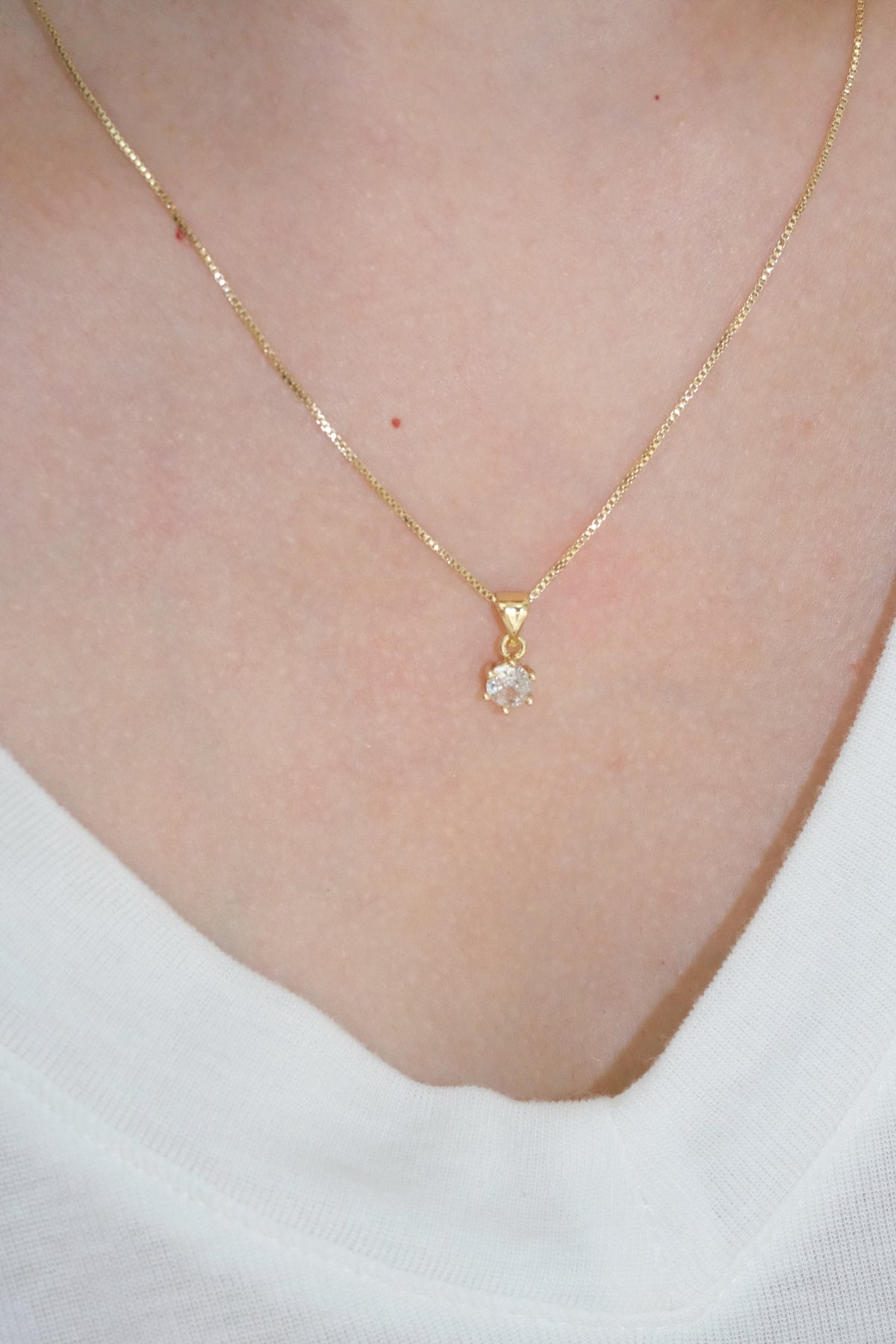Round Solitaire Pendant — Gold — edited real-life photo