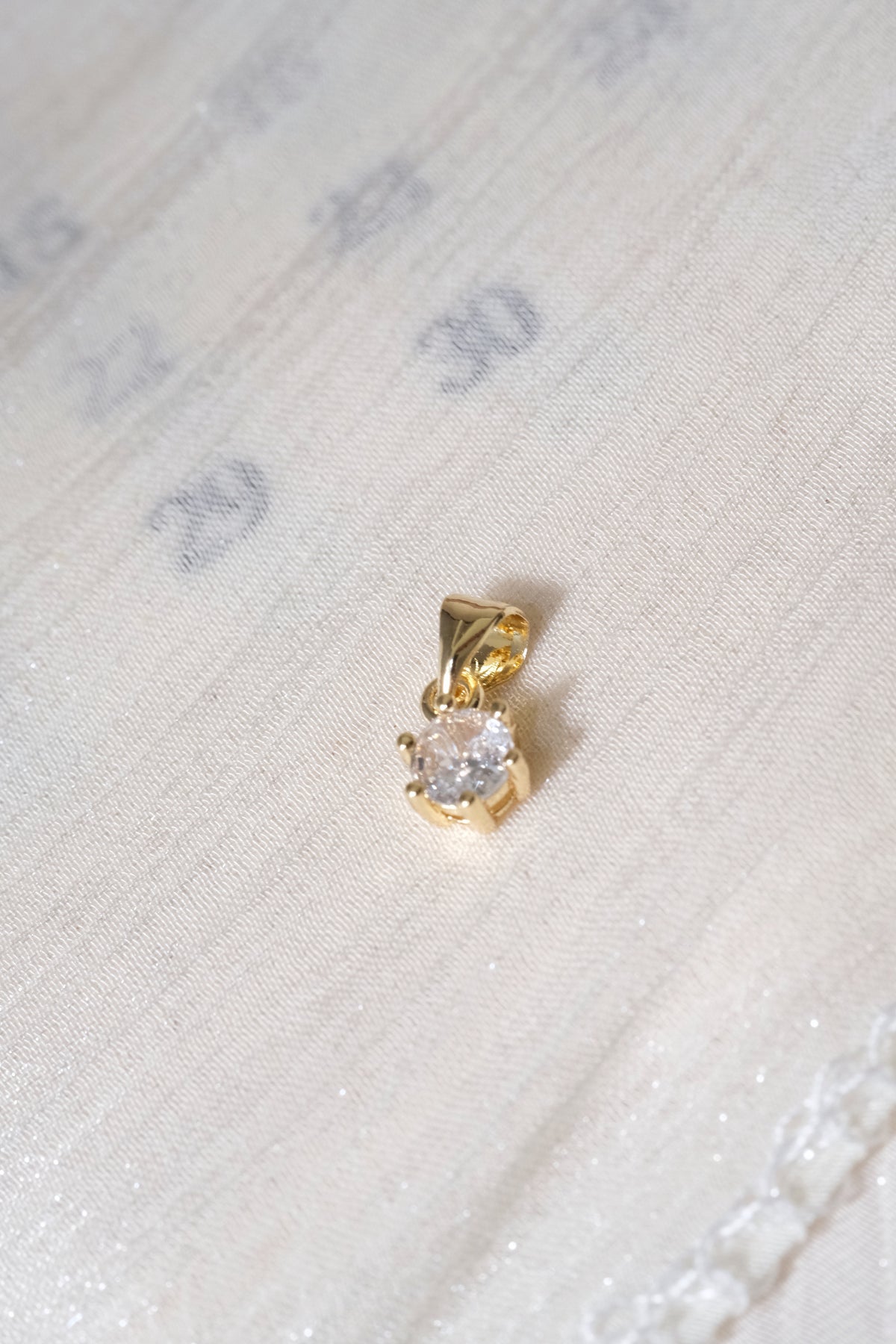 Round Solitaire Pendant — Gold — edited real-life photo