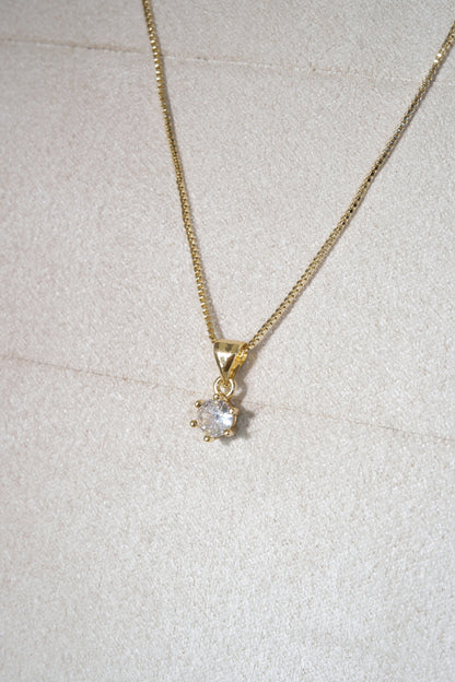 Round Solitaire Pendant — Gold — edited real-life photo