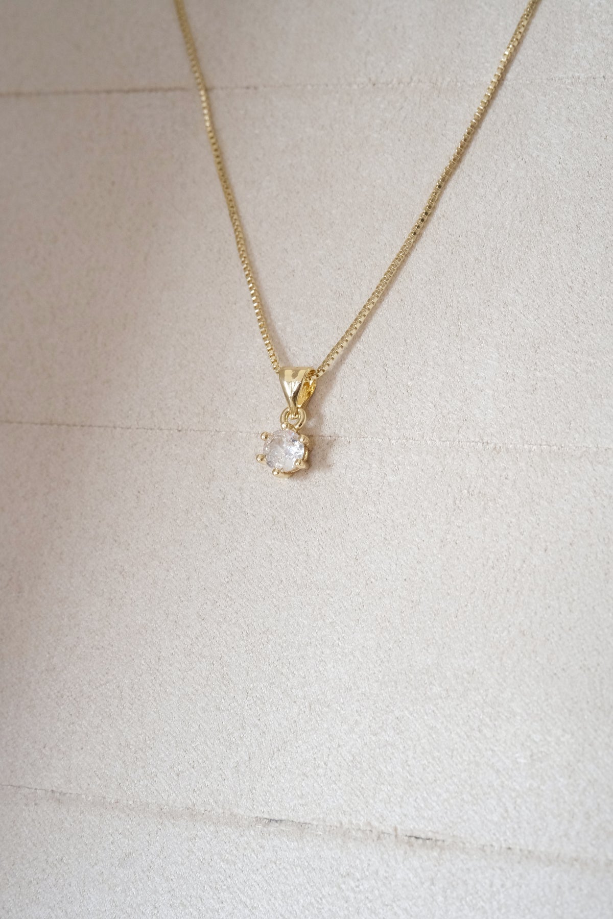 Round Solitaire Pendant — Gold — edited real-life photo