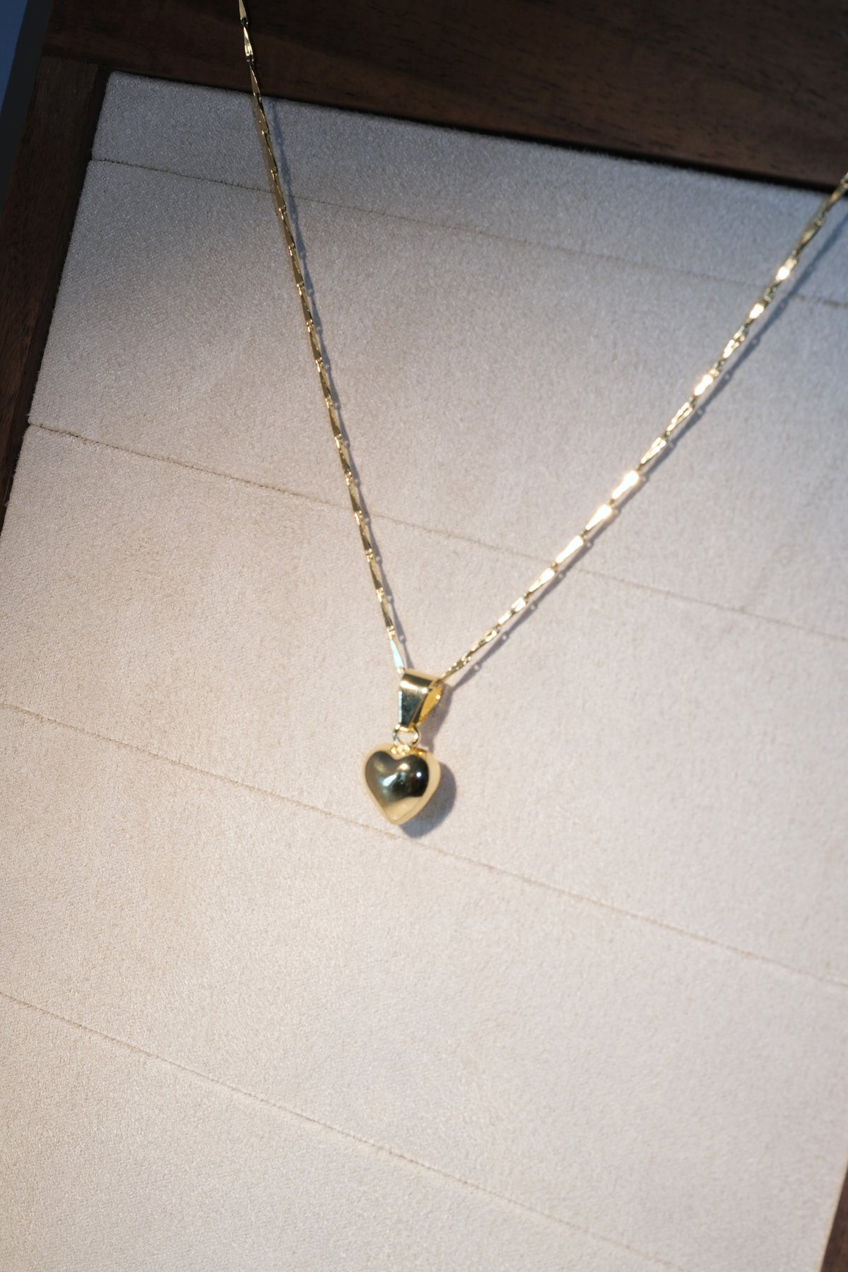 Polished Heart Pendant — Gold — edited real-life photo